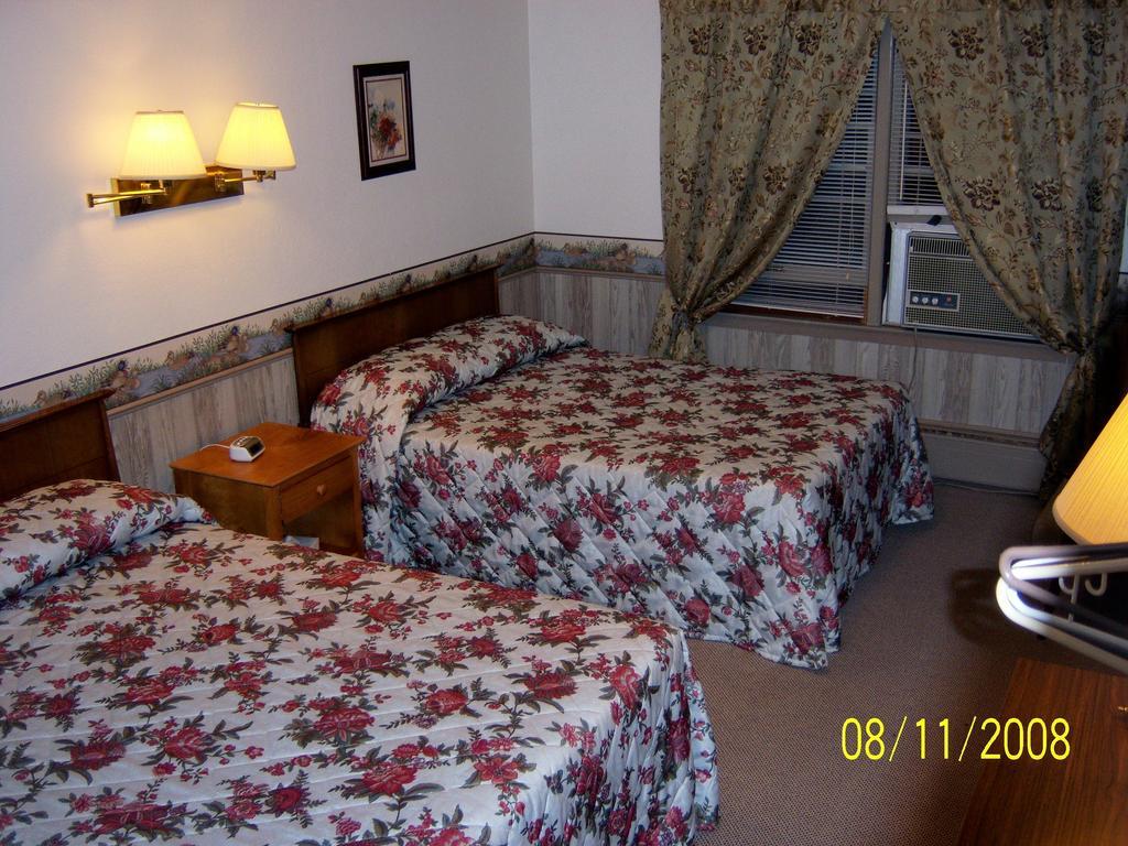 Travelers Inn Motel Игл-Ривер Номер фото